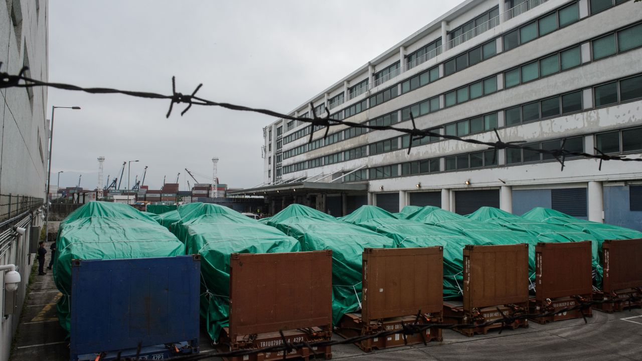 Armored vehicles belonging to the Singapore military seen covered with tarpaulin in Hong Kong.