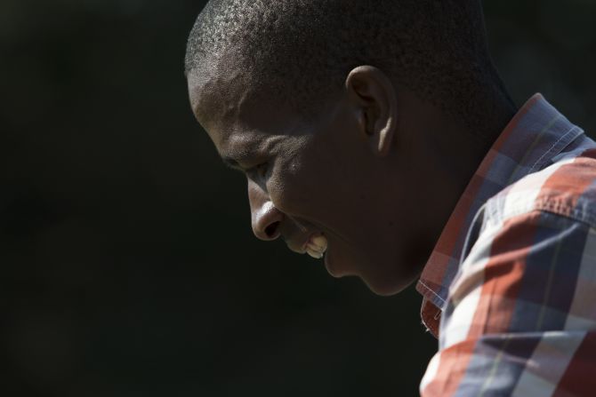 Nhlanhla Phewa, a former clinic attendee, volunteers at the summer camp.