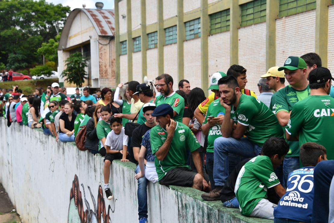 People pay tribute to the players of Brazilian team Chapecoense Real at the club's Arena Conda stadium in Chapeco, Brazil.