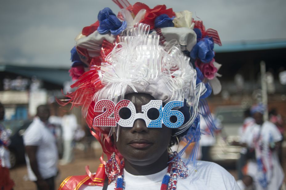 According to the electoral commission, Mahama won the 2012 election with 50.70 percent of the votes cast, compared to opposition candidate Nana Akufo-Addo's 47.74 percent.<br /><br />Picture here, a supporter of Ghana's largest opposition party New Patriotic Party (NPP) is seen at the party manifesto launch in Accra on October 9, 2016. Photo Stefan Heunis/AFP/Getty Images.