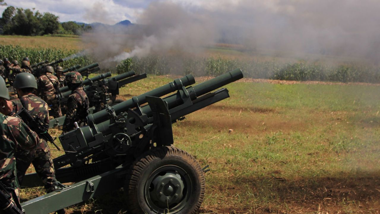 Philippines troops fire cannon at Islamist militant positions in Mindanao.