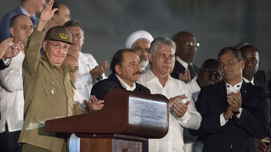 Cuban President Raul Castro, left, Nicaraguan President Daniel Ortega, center, and Ecuadorian President Rafael Correa, far right, take part in the Revolution Square rally on November 29. 