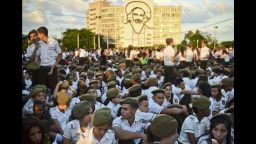 Students gather at Revolution Square to pay homage to late Cuban revolutionary leader Fidel Castro, in Havana, on November 29, 2016.Hundreds of thousands of Cubans swarmed Havana's Revolution Square for a tearful tribute to Fidel Castro on Monday while his brother, Raul, led a private ceremony in front of the late communist icon's ashes. / AFP PHOTO / RONALDO SCHEMIDTRONALDO SCHEMIDT/AFP/Getty Image