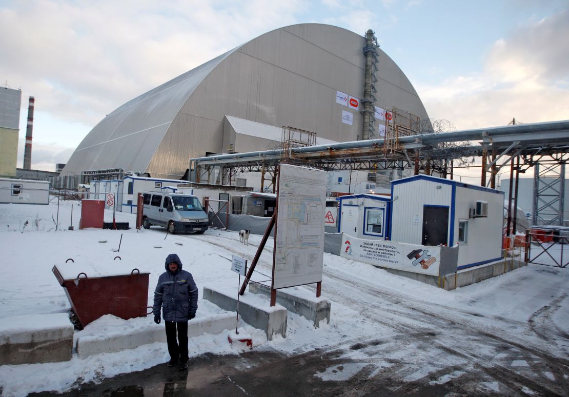 The new protective shield enclosing Chernobyl's damaged reactor was pushed into position Tuesday.   