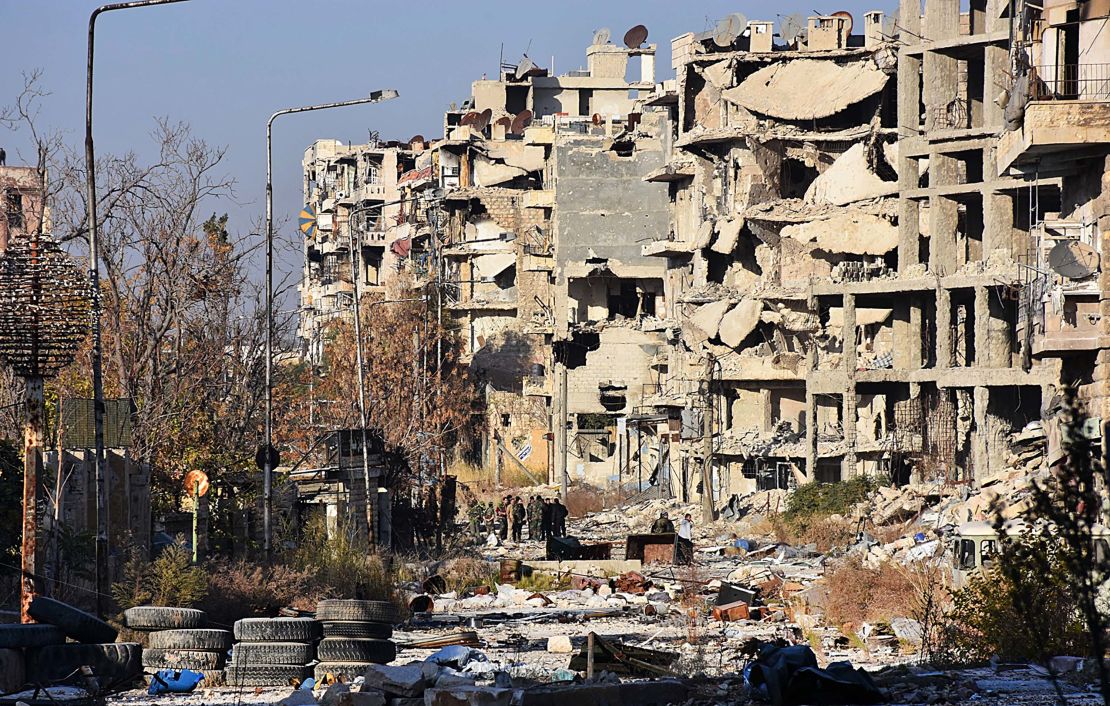 Aleppo's Bustan al-Basha neighbourhood in ruins on Monday during the regime assault.