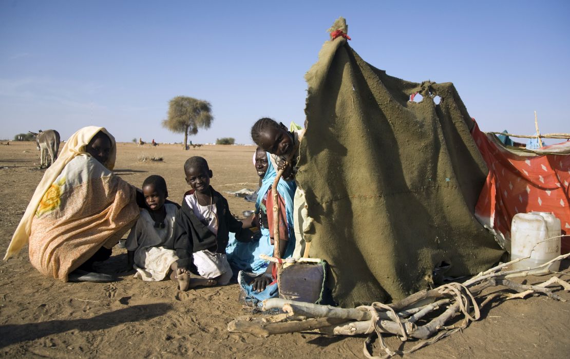 People displaced from Darfur's conflict arrive at Shangel Tubaya in 2010. 