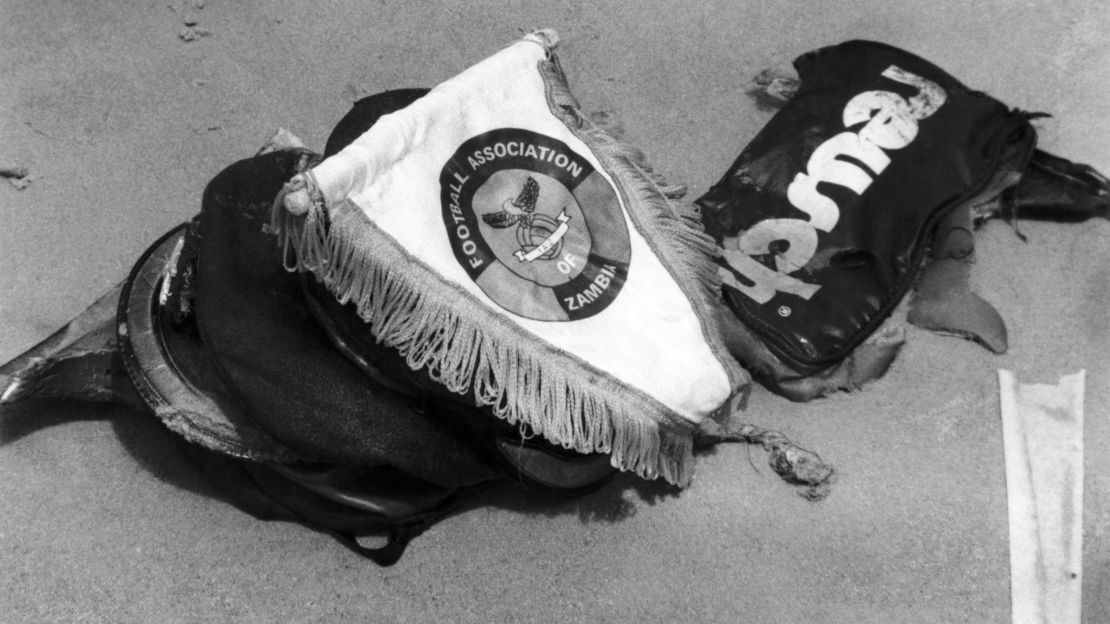 This 1993 photo shows the emblem of the national Zambian football team and some belongings of players found by divers at sea after a plane carrying the team crashed shortly after takeoff from Libreville. All 30 people aboard were killed.