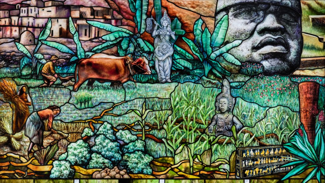 "Roots of Knowledge" is an eighty-panel stained glass installation created by stained glass artist Tom Holdman.
