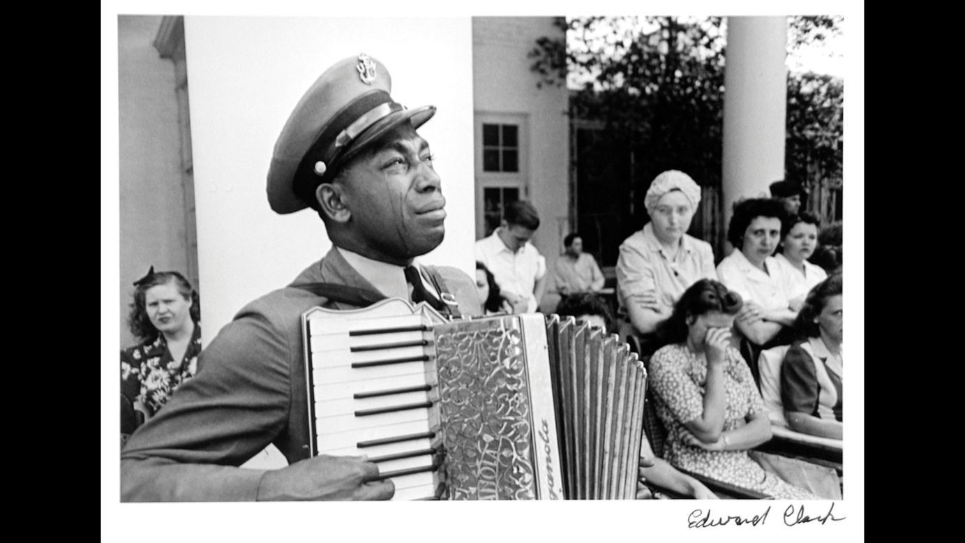 Graham Jackson, a chief petty officer in the US Navy, plays the accordion while mourning the death of former President Franklin D. Roosevelt in 1945. "Having grown up and studying Life magazine, I knew all the photos," Leifer said. "I knew (this) Ed Clark photo, such a famous and wonderful picture."