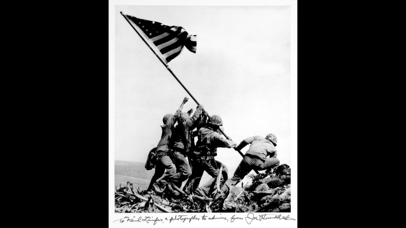 <a href="http://www.cnn.com/2015/02/22/world/cnnphotos-iwo-jima/index.html">Joe Rosenthal's 1945 photograph</a> of US troops raising a flag in Iwo Jima remains one of the most widely reproduced images. It earned him a Pulitzer Prize.