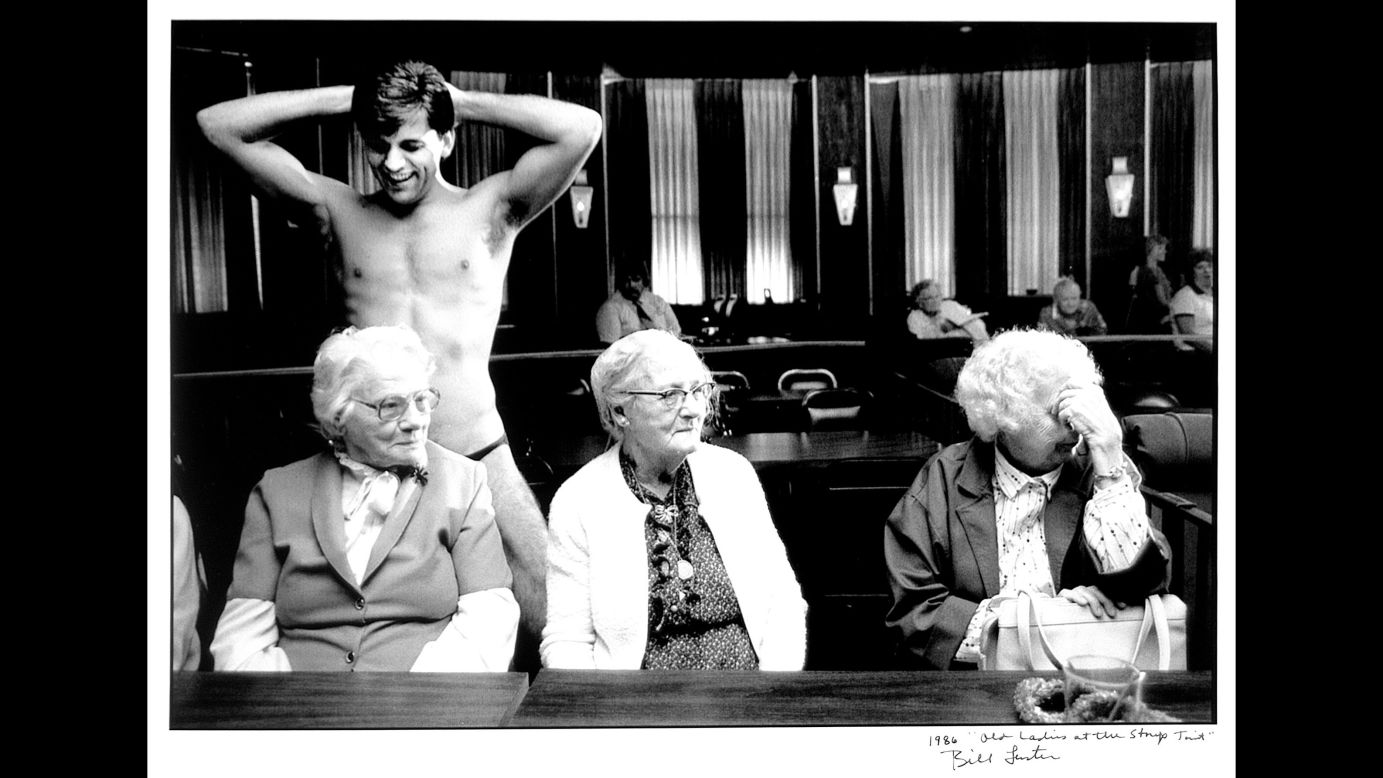 Bill Luster took this photo of a stripper with three older women in 1986.