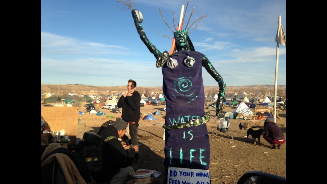 A sculpture stands at an encampment where protesters of the pipeline have been gathered for months.