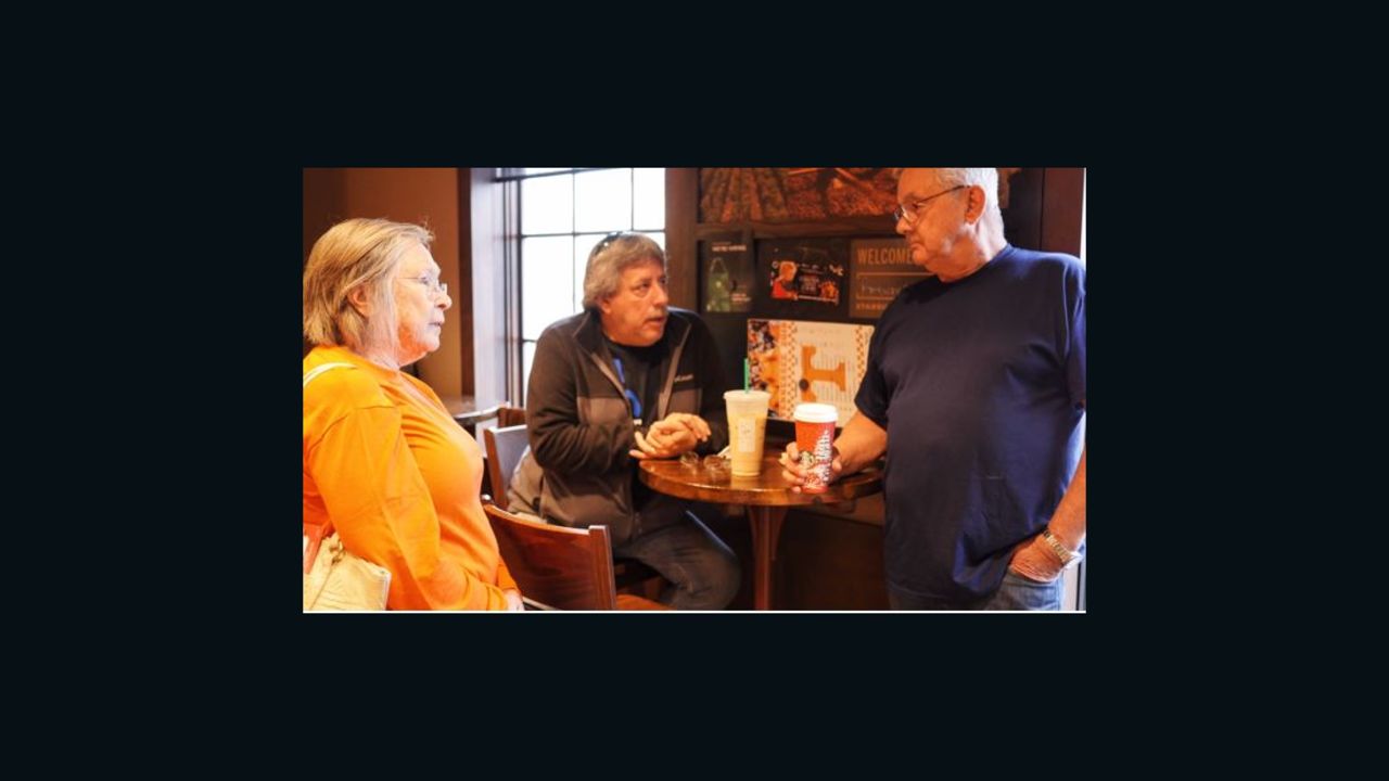 Tim (right) and Shirley Morrison talk with their friend Phil Derosia about the loss of the Morrisons' house in Gatlinburg on Wednesday.