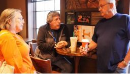 Tim (right) and Shirley Morrison talk with their friend Phil Derosia about the loss of the Morrisons' house in Gatlinburg on Wednesday.