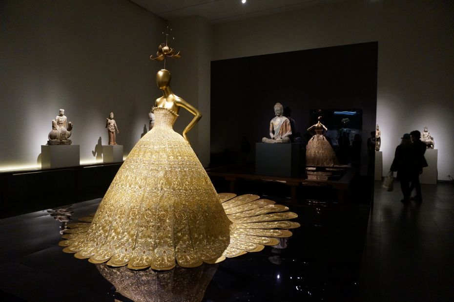 This dress is called "Dajin," but is also known as Magnificent Gold. Embroidered with gold and pearls, it required more than 50,000 hours of work.