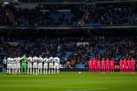 Soccer players from Real Madrid and Cultural Leonesa observe a minute of silence in Madrid to pay tribute to those killed in the crash.