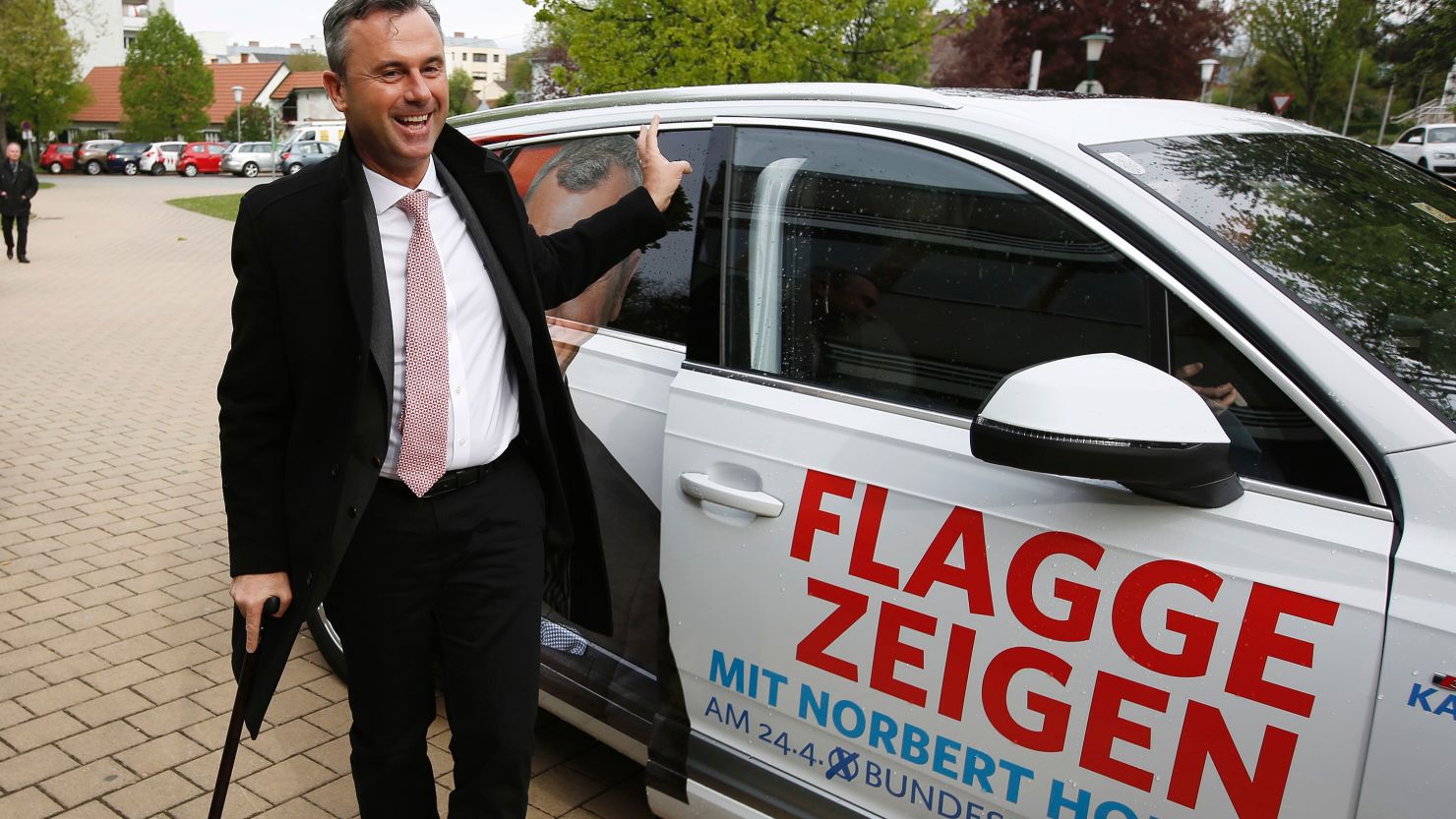 Far-right candidate Norbert Hofer has carried a walking stick since a paragliding accident in 2003.