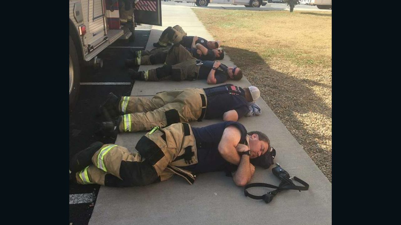 Firefighters from the Johnson City Professional Firefighters Association L-1791 rest after 36 hours of battling the fires around Gatlinburg.
