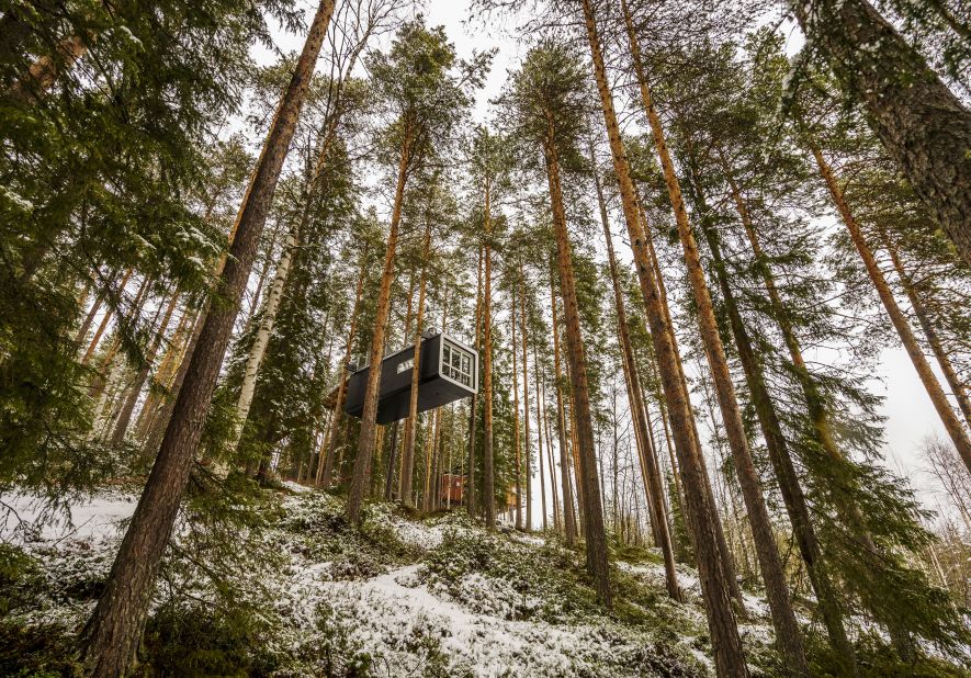 "The Cabin", a prefabricated tree house in northern Sweden, is so high up in the trees that it overlooks the entire Lule River valley.