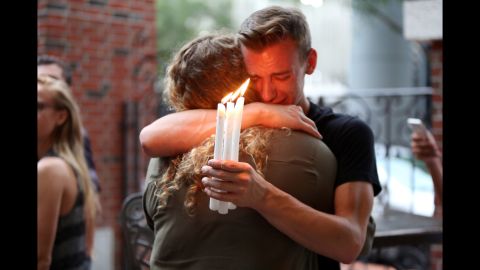 <strong>June 12:</strong> People attend a candlelight vigil for the victims of <a href="http://www.cnn.com/interactive/2016/06/us/cnnphotos-orlando-portraits/" target="_blank">the Orlando nightclub shooting.</a> At least 49 people were killed in what was the deadliest mass shooting in US history.