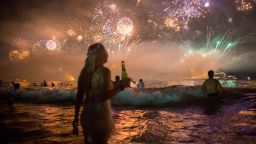 In this Jan. 1, 2016 photo, fireworks light the sky over Copacabana beach during New Year's Eve celebrations in Rio de Janeiro, Brazil.  (AP Photo/Mauro Pimentel)