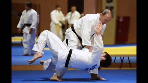 <strong>January 8:</strong> Russian President Vladimir Putin, top, trains with his country's judo team in Sochi, Russia.