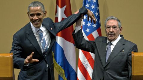 <strong>March 21:</strong> Cuban President Raul Castro tries to lift up the arm of US President Barack Obama at the end of <a href="http://www.cnn.com/2016/03/21/politics/obama-cuban-raul-castro/" target="_blank">a joint news conference</a> in Havana, Cuba. Though they both acknowledged deep disagreements on human rights, political prisoners and economic reforms, the two leaders found common ground on the topic of the economic embargo on Cuba, which both want lifted. Obama went so far as to declare that "the embargo's going to end," though he couldn't say when.