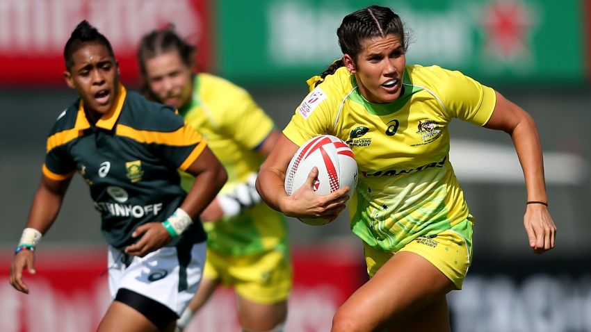 DUBAI, UNITED ARAB EMIRATES - DECEMBER 01:  Charlotte Caslick of Australia in action during day one of the Emirates Dubai Rugby Sevens - HSBC World Rugby Women's Sevens Series on December 1, 2016 in Dubai, United Arab Emirates.  (Photo by Francois Nel/Getty Images)