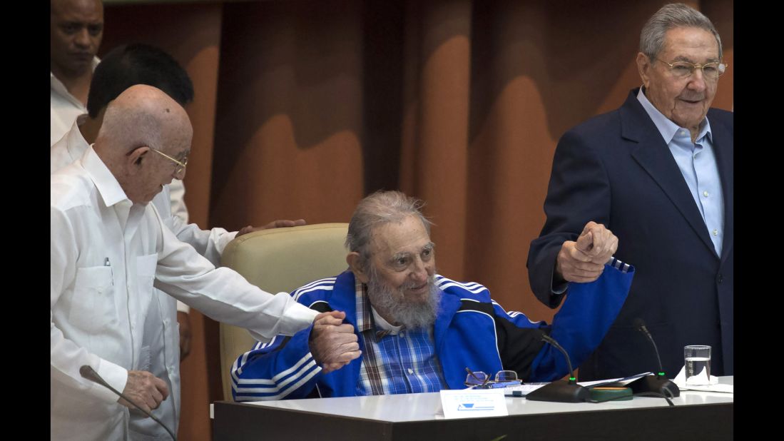 <strong>April 19:</strong> Former Cuban leader Fidel Castro, center, attends the closing ceremonies of a Cuban Communist Party gathering in Havana, Cuba. Castro formally stepped down in 2008, and his brother Raul, right, is now President. <a href="http://www.cnn.com/2015/07/05/world/gallery/fidel-castro/index.html" target="_blank">Fidel Castro</a> died in November at age 90.