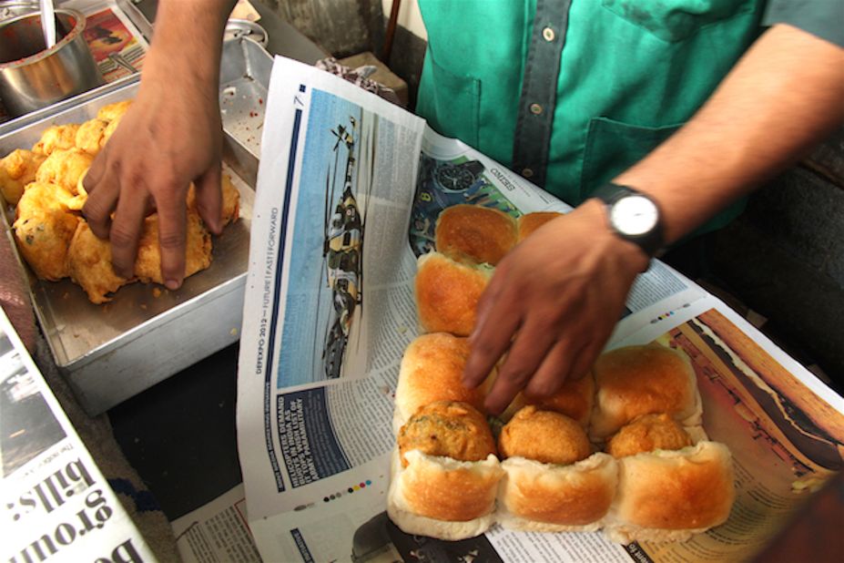 This home-grown version of the veggie burger is probably Mumbai's favorite street snack. A plump and warm fried vada (potato patty) is placed inside a pav (thick bun) that's been sliced open and smeared with fiery garlic and chilli chutney. 