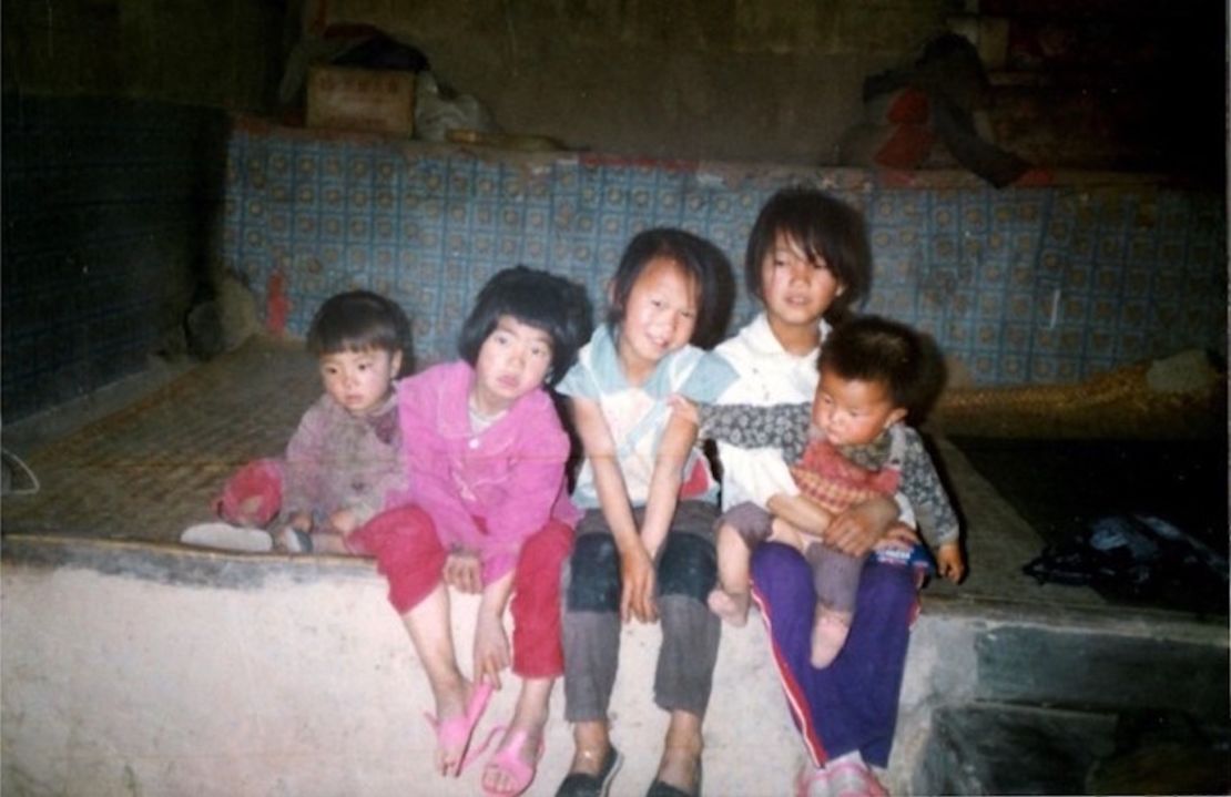 Girls born during China's one-child policy sit in a village northwest China.