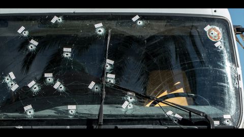 <strong>July 15:</strong> Evidence stickers and bullet holes are seen on the windshield of the truck used in a terrorist attack in Nice, France. A man <a href="http://www.cnn.com/2016/07/21/europe/nice-france-attacker-plot-accomplices/" target="_blank">deliberately drove a truck into a crowd,</a> killing 84 people on Bastille Day. Authorities said the man plotted his attack for months with "support and accomplices." <a href="http://www.cnn.com/2016/07/17/world/cnnphotos-nice-france-day-after-attack/index.html" target="_blank">Life after the truck attack</a>