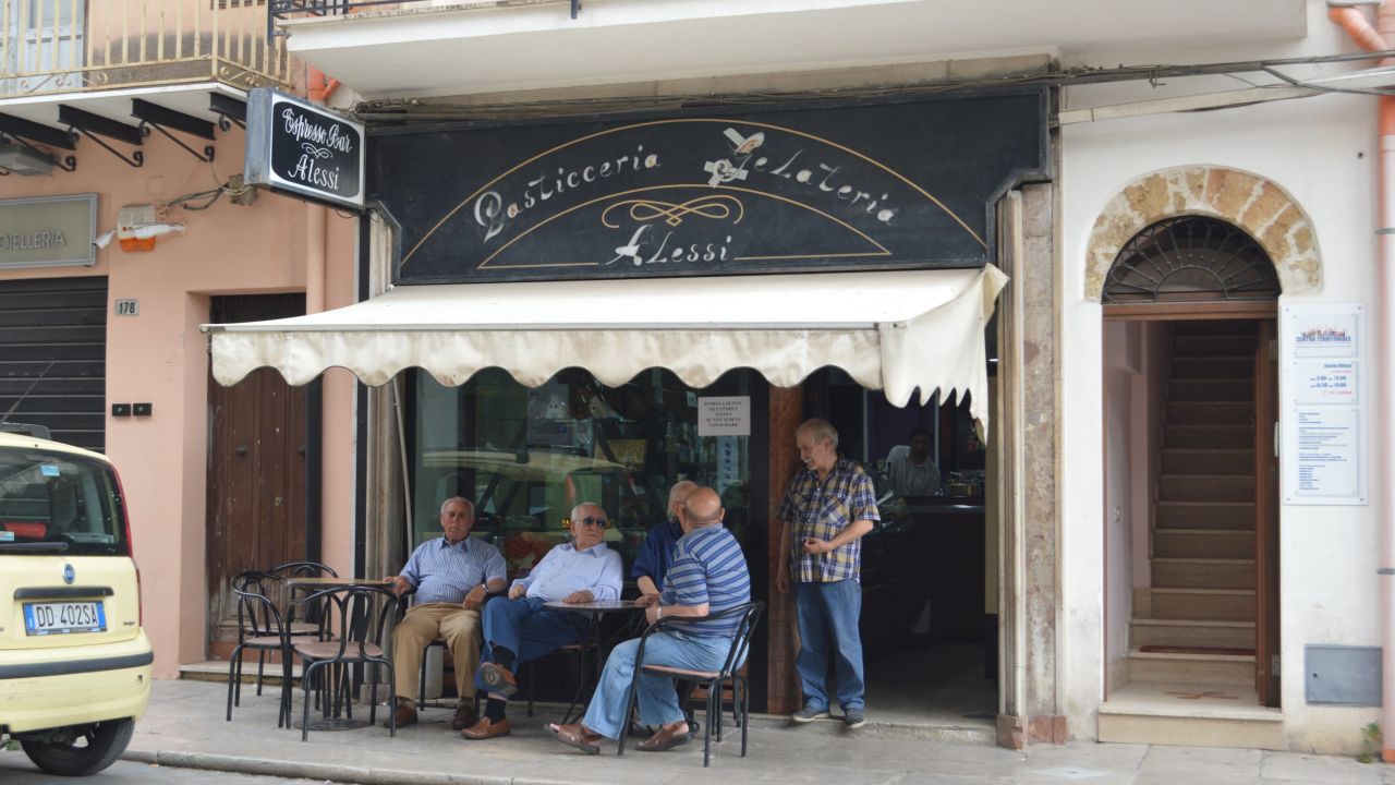 Espresso Bar Alessi is Maniaci's favorite cafe. The glass windows seen here are bulletproof.