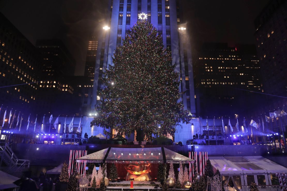 The Rockefeller Center Christmas tree stands lit during the 84th annual lighting ceremony.