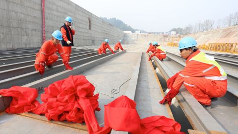 Workers lay the keel of a replica Titanic in China's Sichuan province.