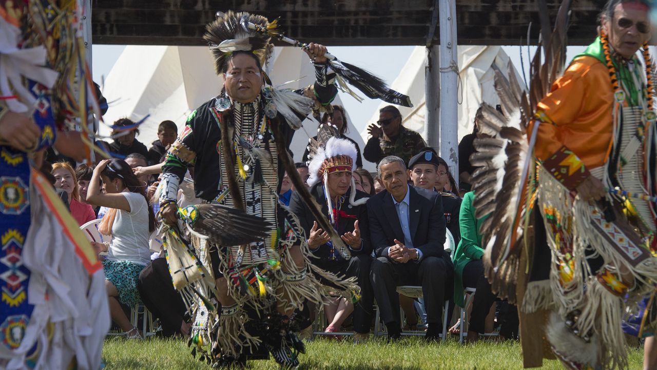 President Obama talks with Standing Rock Sioux Chairman David Archambault II during the Cannon Ball Flag Day Celebration on June 13, 2014.