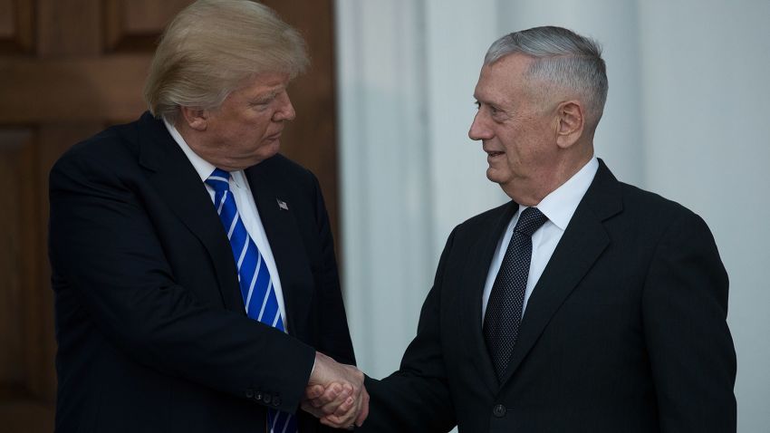 President-elect Donald Trump shakes hands with retired United States Marine Corps general James Mattis after their meeting at Trump International Golf Club, November 19, 2016 in Bedminster Township, New Jersey. Tr