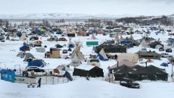 CANNON BALL, ND - NOVEMBER 30:  Snow covers Oceti Sakowin Camp near the Standing Rock Sioux Reservation on November 30, 2016 outside Cannon Ball, North Dakota. Native Americans and activists from around the country have been gathering at the camp for several months trying to halt the construction of the  Dakota Access Pipeline. The proposed 1,172 mile long pipeline would transport oil from the North Dakota Bakken region through South Dakota, Iowa and into Illinois.  (Photo by Scott Olson/Getty Images)