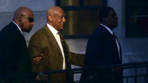 <strong>February 2:</strong> Comedian Bill Cosby, second from left, leaves a courthouse in Norristown, Pennsylvania, after a preliminary hearing. Cosby <a href="http://www.cnn.com/2016/05/24/us/bill-cosby-hearing/" target="_blank">faces three counts of felony aggravated indecent assault</a> from a 2004 case involving Andrea Constand, an employee at his alma mater, Temple University. She was the first of more than 50 women who have accused Cosby of sexual misconduct. Cosby has denied the allegations.