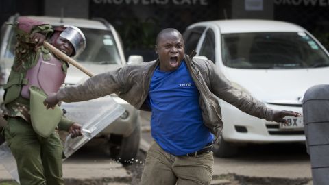 <strong>May 16:</strong> An opposition protester yells as he is beaten by riot police in Nairobi, Kenya. Police in Kenya's capital <a href="http://www.cnn.com/2016/05/17/africa/kenya-police-violence/" target="_blank">came under fire</a> for what critics said was a heavy-handed response to a largely peaceful opposition protest. Kenya's police chief called for an internal investigation, according to Interior Ministry spokesman Mwenda Njoka.