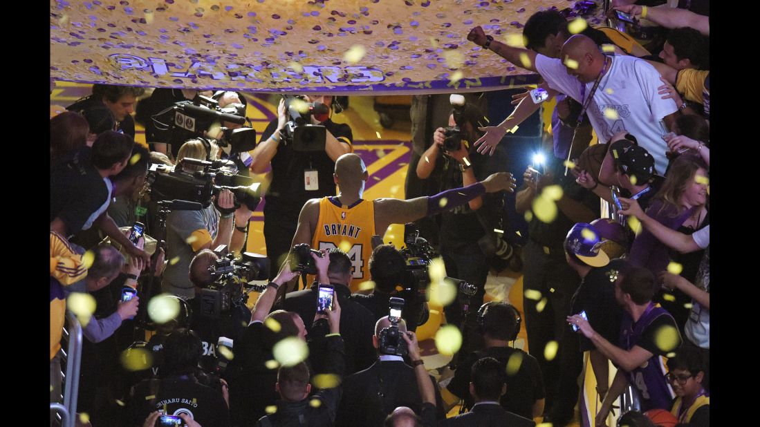 NBA star Kobe Bryant waves to the crowd in Los Angeles <a href="http://www.cnn.com/2016/04/13/sport/kobe-bryant-final-game/" target="_blank">after playing the final game of his 20-year career</a> on Wednesday, April 13. Bryant, the third-leading scorer in NBA history, finished the game with 60 points and rallied the Lakers to a comeback victory against Utah.