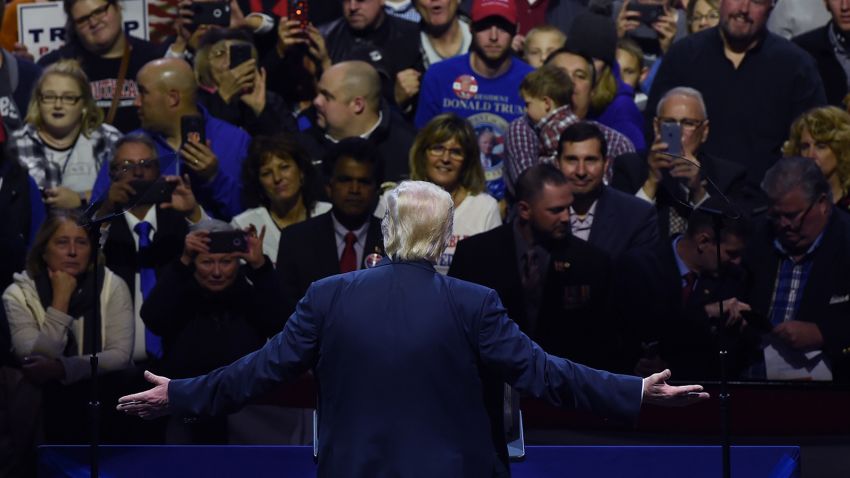 President-elect Donald Trump greets teh audience during the USA Thank You Tour at the US Bank Arena in Cincinnati, Ohio on December 1, 2016.