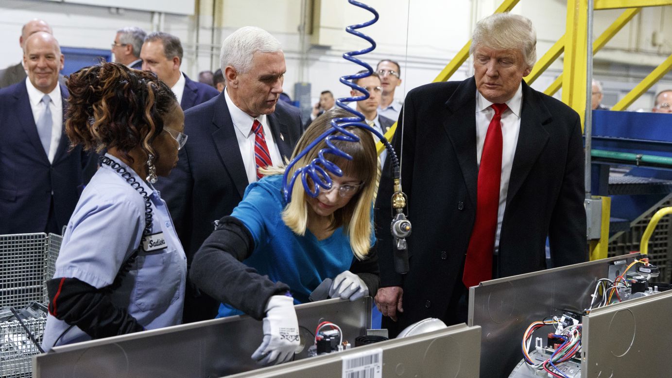 President-elect Donald Trump and Vice President-elect Mike Pence watch as employees work during a visit to a Carrier factory on Thursday, December 1, in Indianapolis. The two were on a tour of the factory following the news that the air conditioning company closed a deal with Trump to <a href="http://money.cnn.com/2016/12/01/news/companies/donald-trump-carrier-jobs/" target="_blank">keep roughly 1,000 jobs from moving to Mexico.</a>