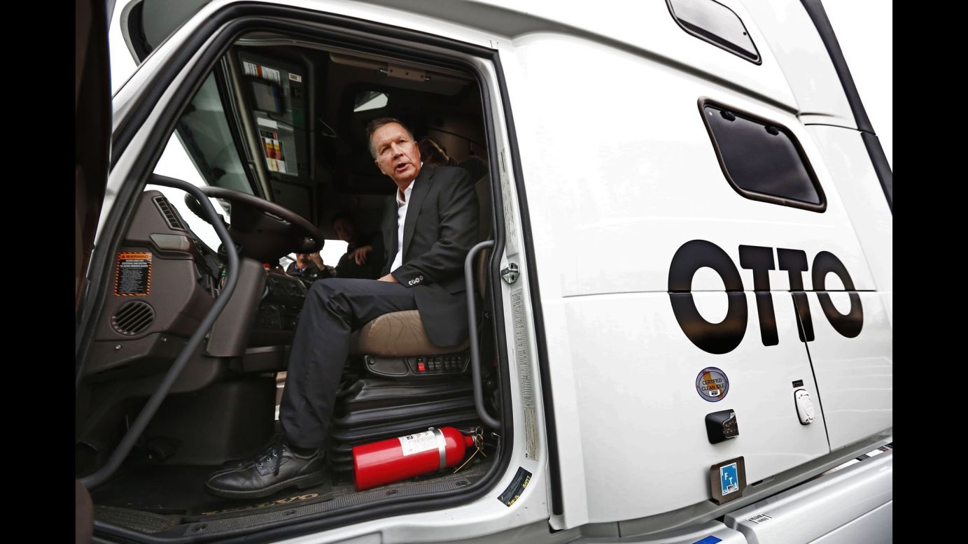 Ohio Gov. John Kasich checks out a self-driving truck made by autonomous vehicle company Otto on November 30. Kasich announced a $15 million investment in advanced self-driving highway technology on Wednesday. The self-driving truck recently <a href="http://money.cnn.com/2016/10/25/technology/otto-budweiser-self-driving-truck/" target="_blank">hauled over 50,000 cans of beer</a> on a Colorado highway. 