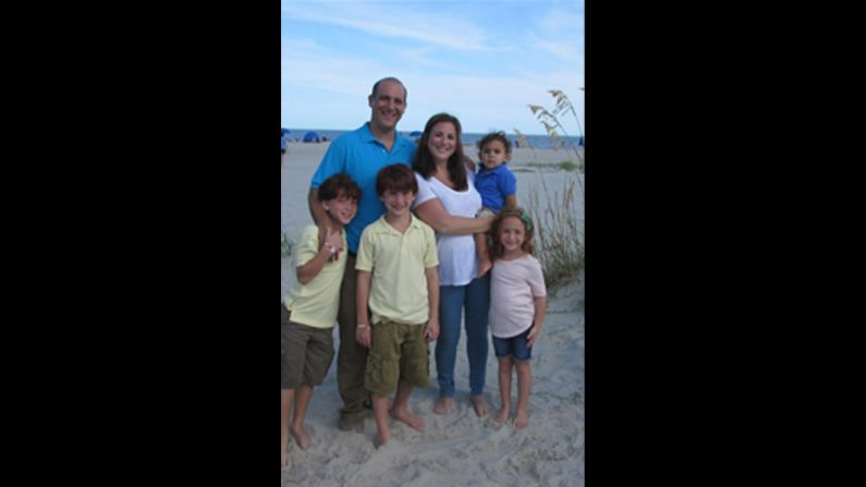 Monica Schulman with her husband and four children on vacation in August 2014. In 2015 she was diagnosed with Parkinson's disease. 