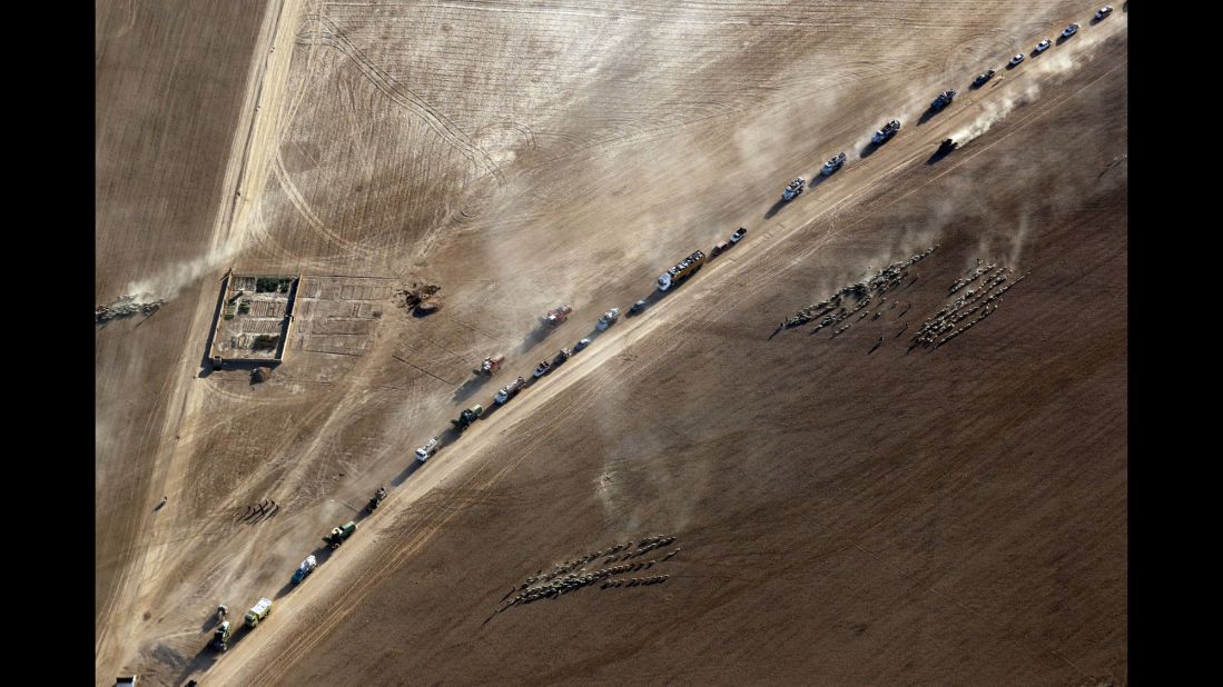 Displaced civilians return to the village of Tall Abtah on Friday, November 25, after Iraqi forces retook the village from ISIS.