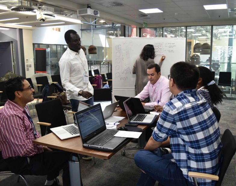 Siwo believes cancer and other non-communicable diseases will start to impact Africans more so than elsewhere, due to how unprepared the region is to handle new cases. "We are attempting to find long term solutions," he says. <br />Pictured: researchers at work in South Africa. 