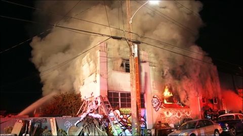 A fire breaks out Friday night, December 2, during a party at a two-story warehouse and artists' studio in Oakland, California. Initial reports indicate dozens of people were in the building when the deadly blaze started, the Oakland fire chief says.