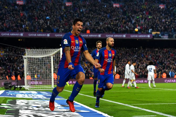 Luis Suarez celebrates scoring the opening goal in El Clasico for Barcelona.