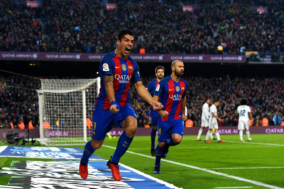 Luis Suarez celebrates scoring the opening goal in El Clasico for Barcelona.